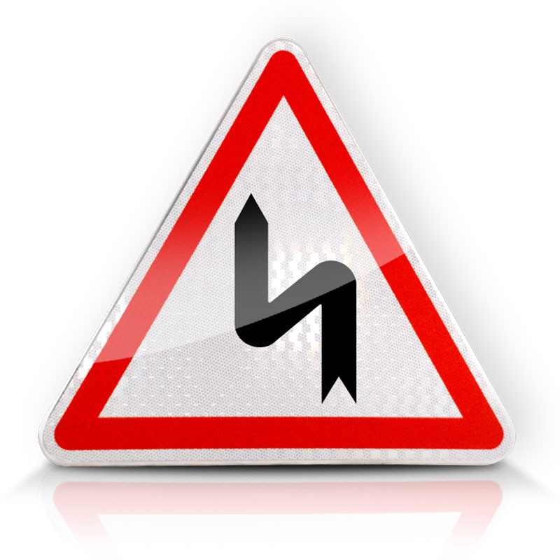 Panneau de danger succession de virages dont le 1er est à gauche A1D